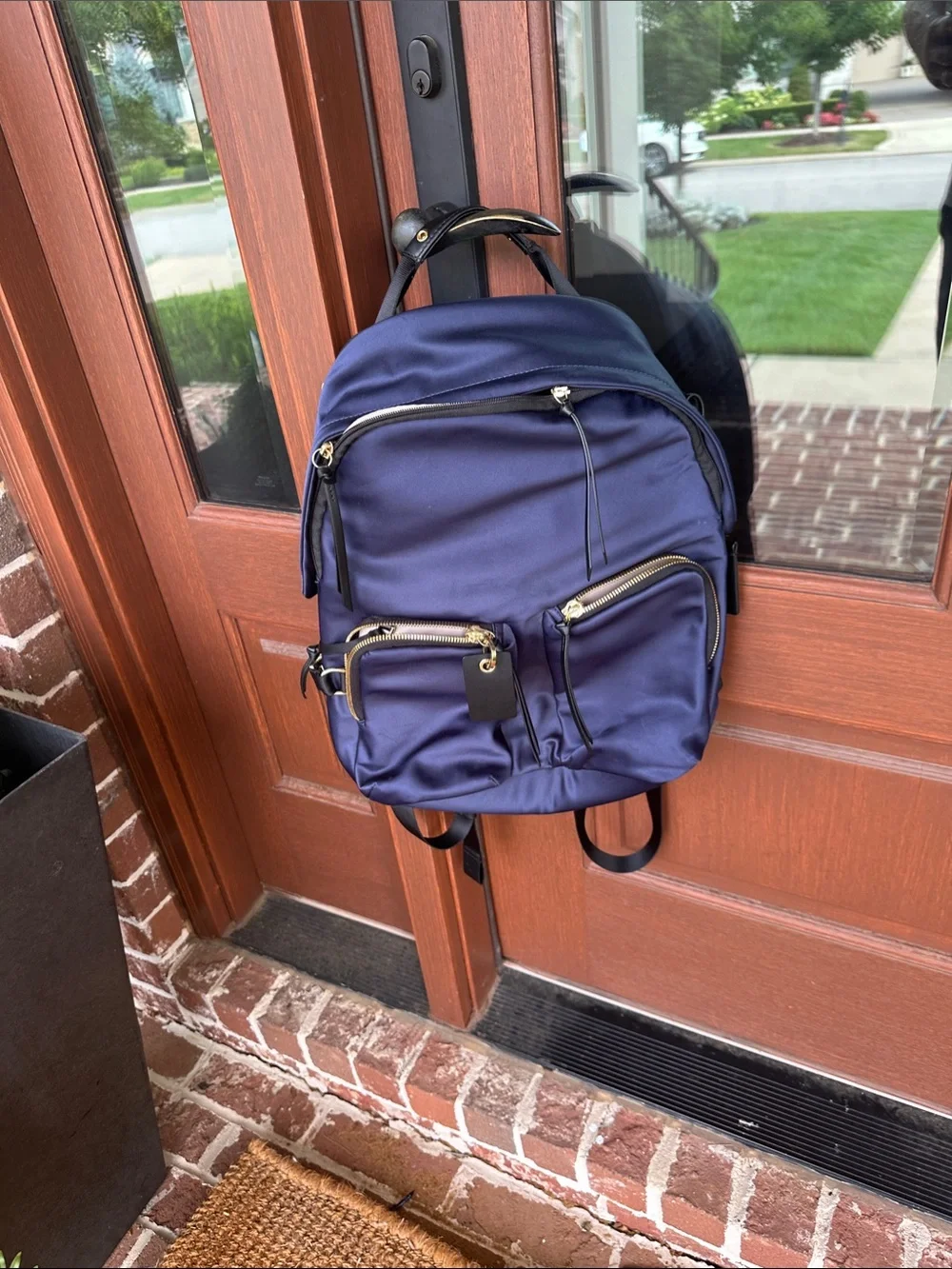 Tumi Navy Backpack with Gold-Tone Hardware